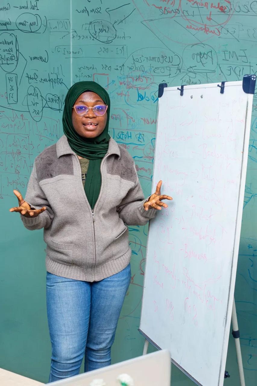 Figure Academy community member at a computer